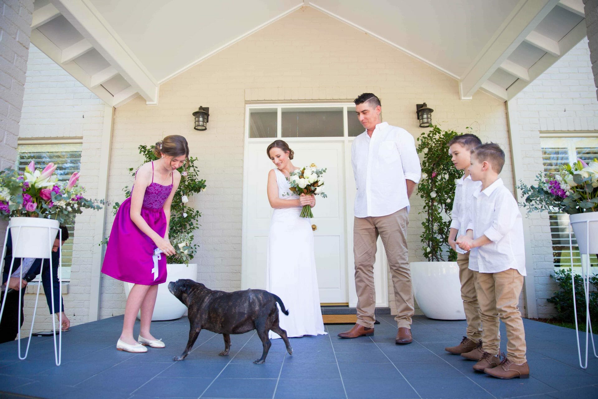Family at the alter and the dog at the wedding at whitebridge ceremony, NSW