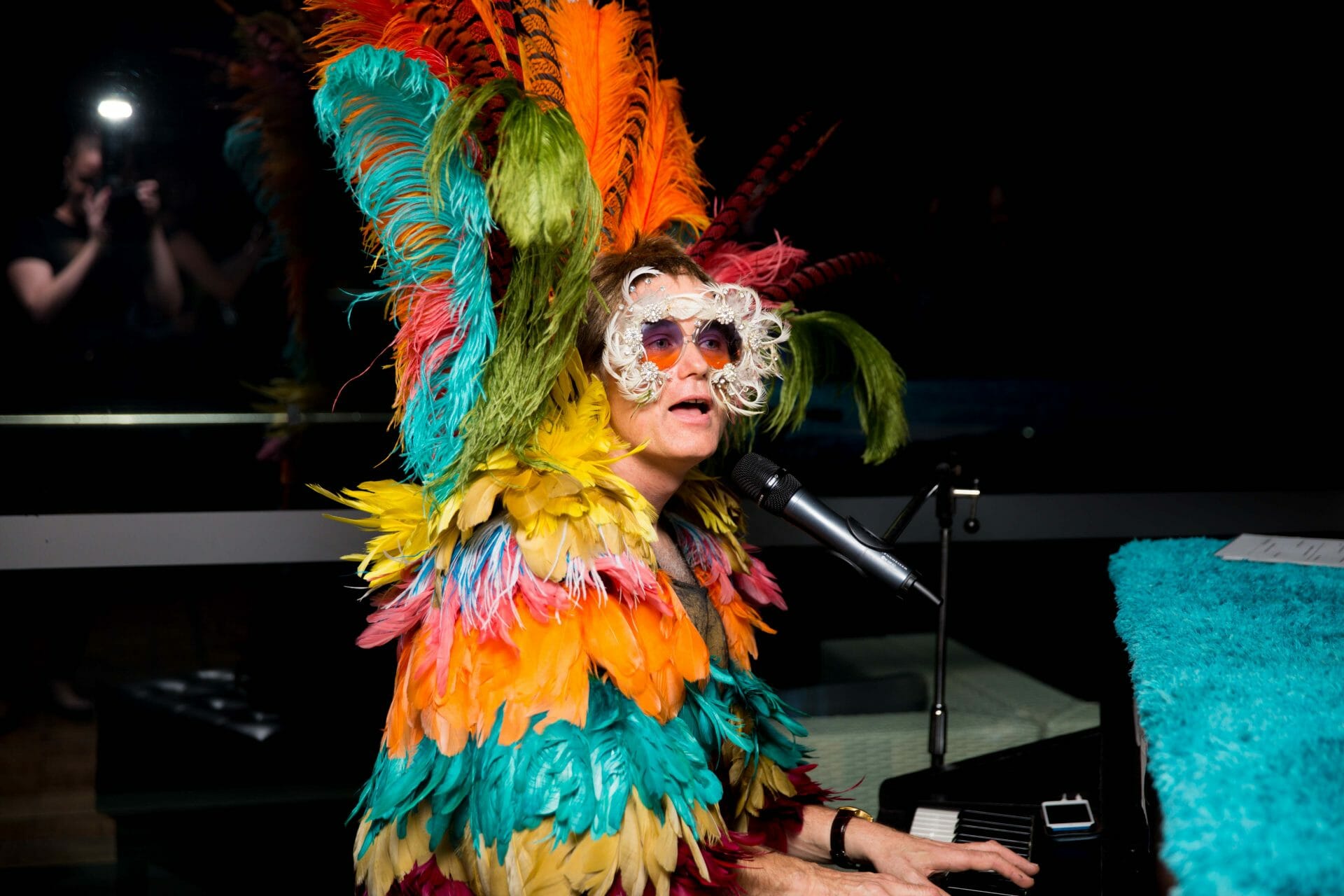 performer playing piano for charity event at Merewether Surf house